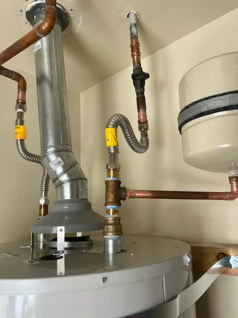 Water heater installation and plumbing repair in Academy